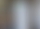 Bild der Station (weiß, 12 Fächer) vor dem Eingang der Bücherei. Nahaufnahme.