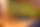 Ecke für Sitzkreis mit einer Sitzbank und einem Teppich, im Hintergrund Spielzeug