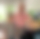 Nette Nachbarn Martina und Thomas Eilks halten den Präsentkorb der Ihnen vom Ersten Bürgermeister Martin Schäfer übergeben wird.