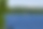 Starnberger See im Sommer: weiße Segelboote ziehen übers tiefblaue Wasser