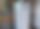 Bild der Station (weiß, 12 Fächer) vor dem Eingang der Bücherei. Nahaufnahme.